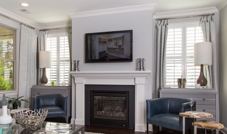 Dallas fireplace with plantation shutters.